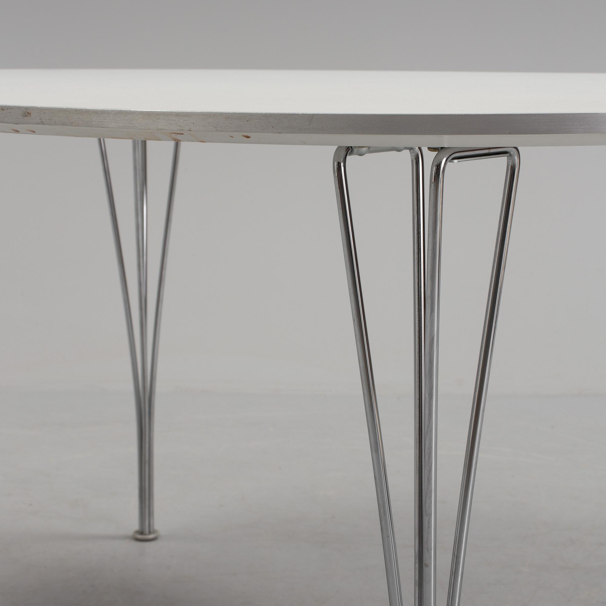 BRUNO MATHSSON AND PIET HEIN, a 'Superellips' dining table from Fritz Hansen, 2005.