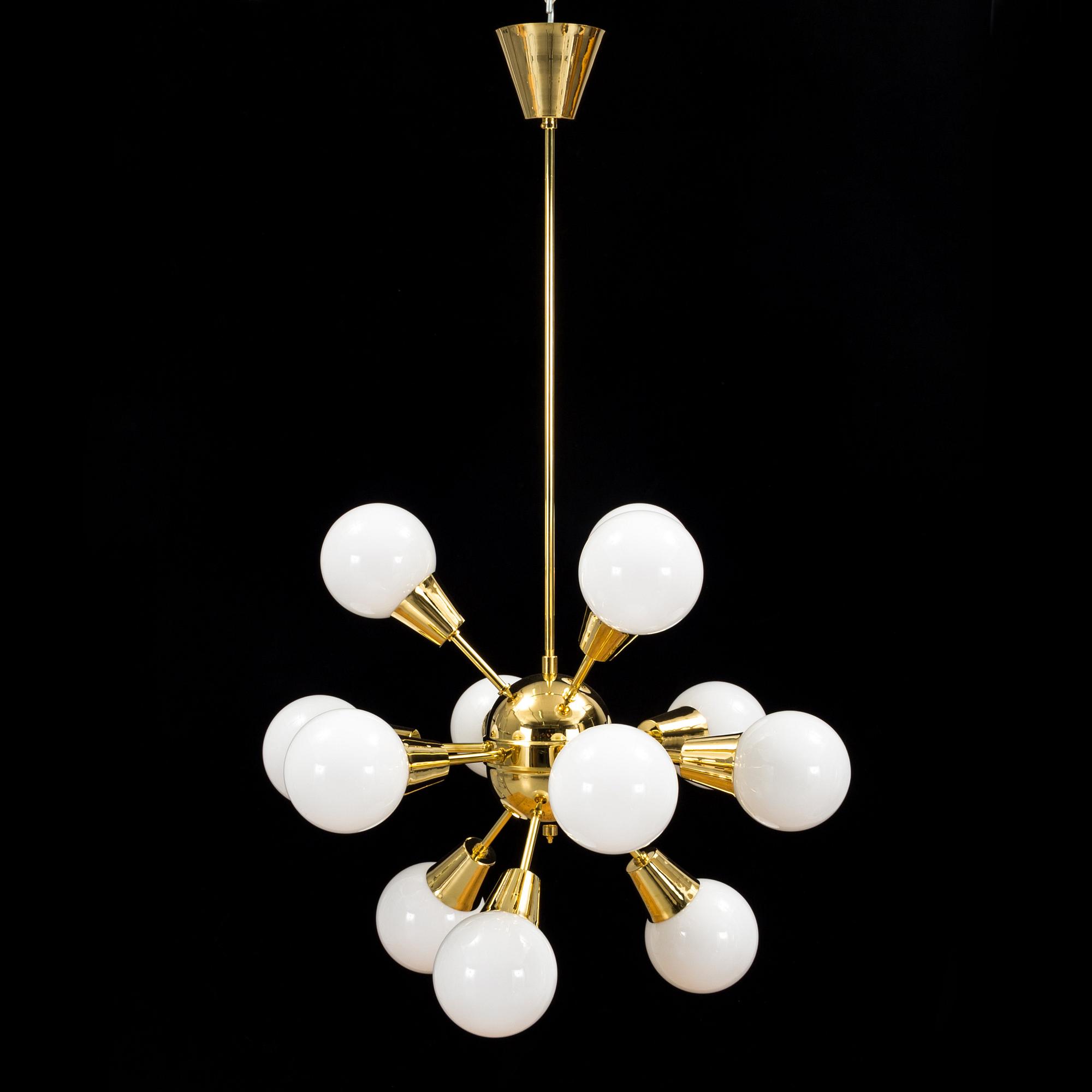 a brass and glas "Sputnik"-model ceiling light from the second half of the 20th century. Height ca 100 cm.
