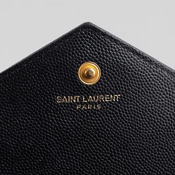 Yves Saint Laurent, a handbag/clutch.