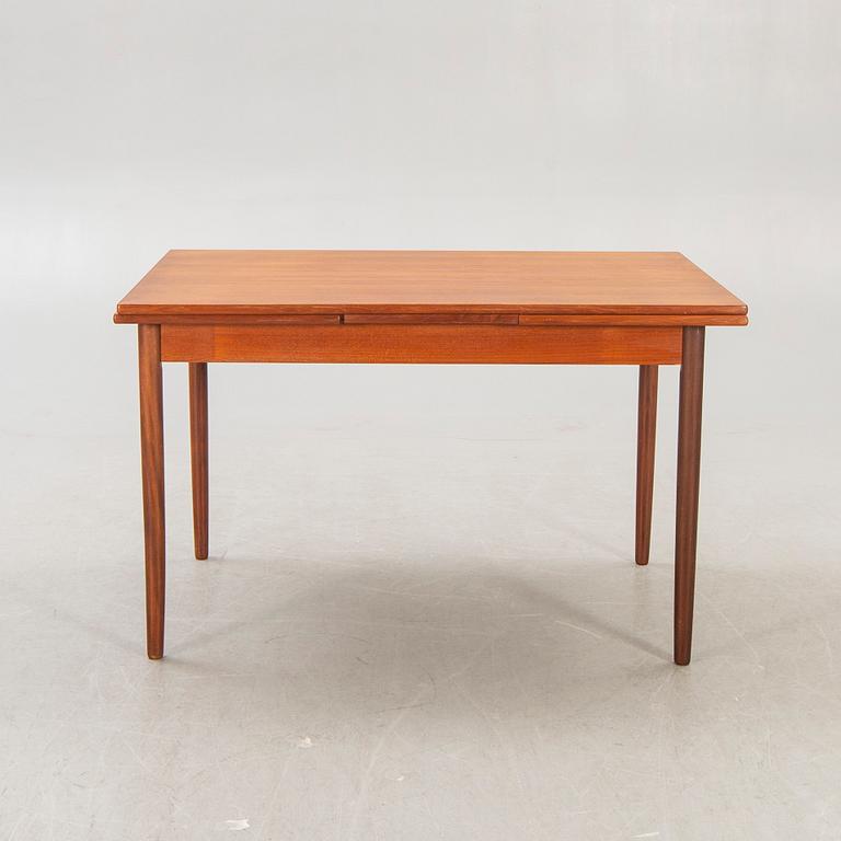 A Danish 1960s teak dining table.