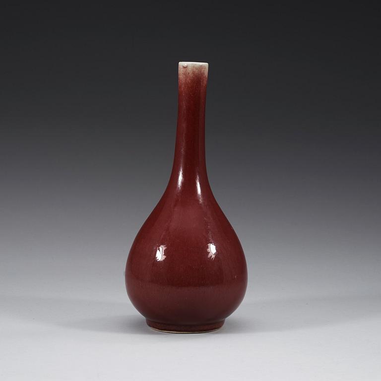 A 'sang de boeuf' glazed vase, late Qing dynasty (1662-1912).