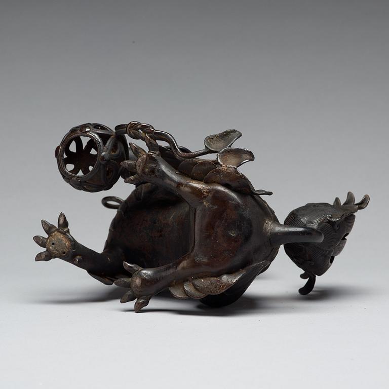 A bronze censer with cover in the shape of a Buddhist lion, Qing dynasty, 19th Century.