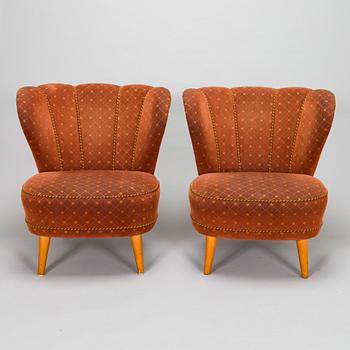A pair of late 20th century armchairs.