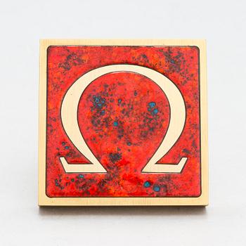 Omega, A door handle from the latter half of the 20th century.
