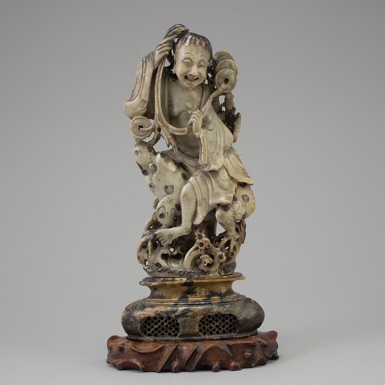 a 19th century chinese soapstone figure.