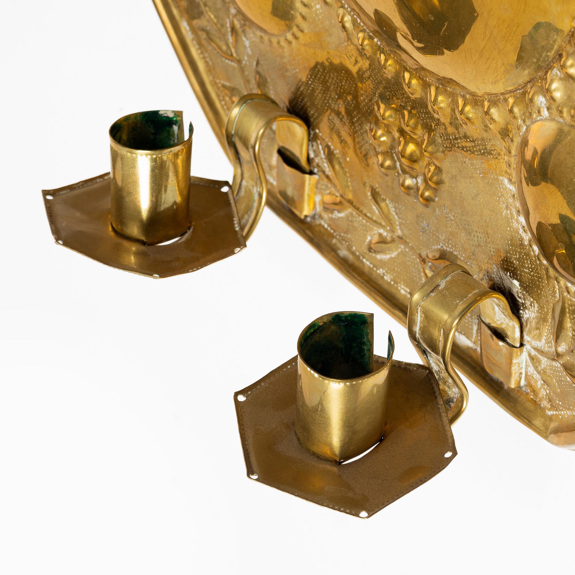 A pair of Barique-style brass wall sconces, early 20th century.