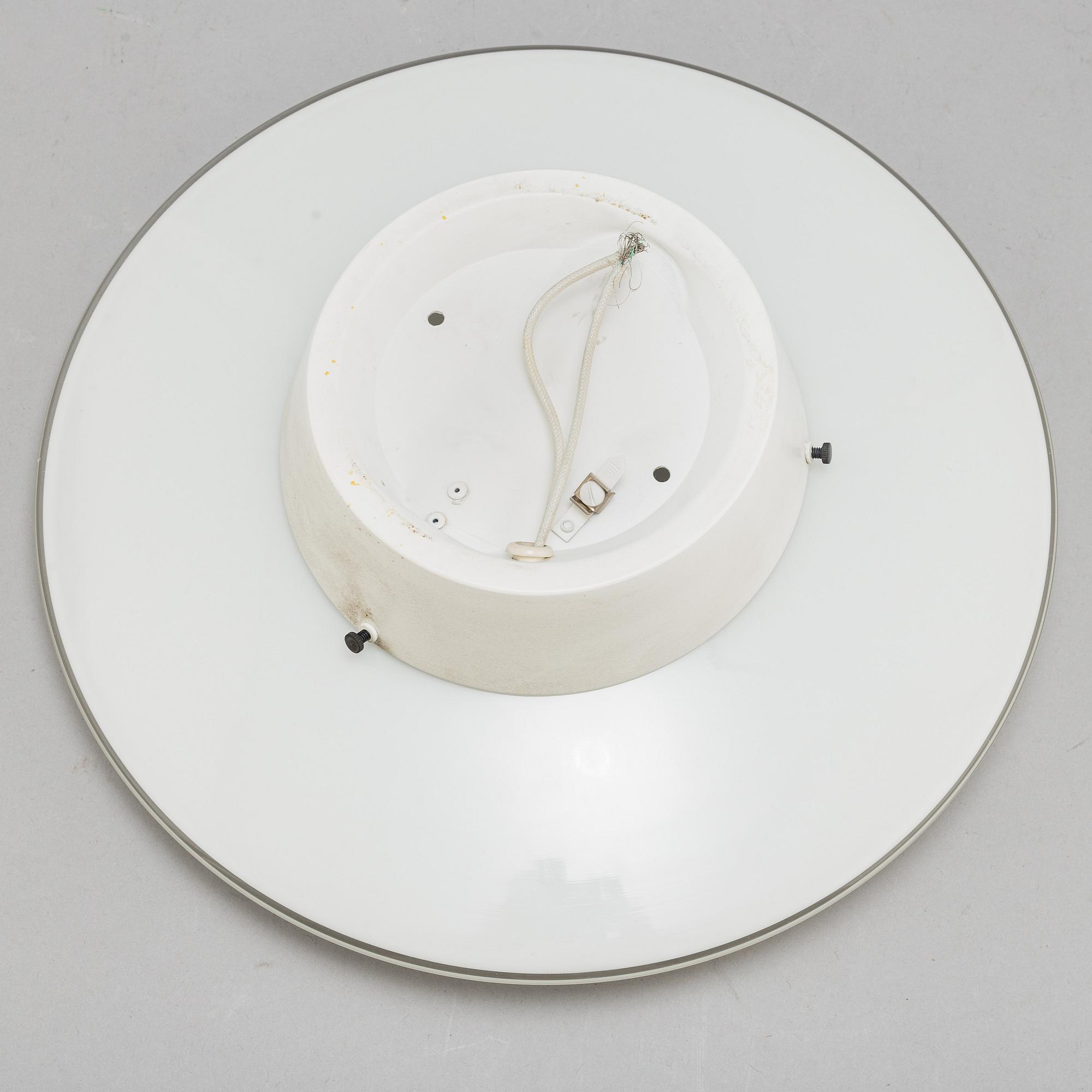 ARNE JACOBSEN, a wall- /ceiling light 'AJ-Eklipta', designed 1959.