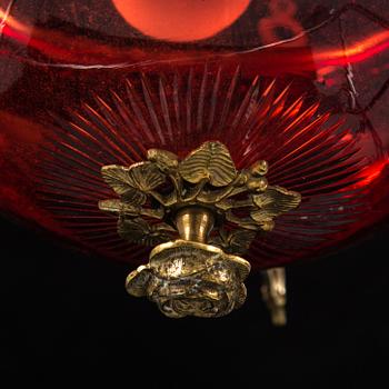 A red glass hanging lamp, second half of the 19th century.