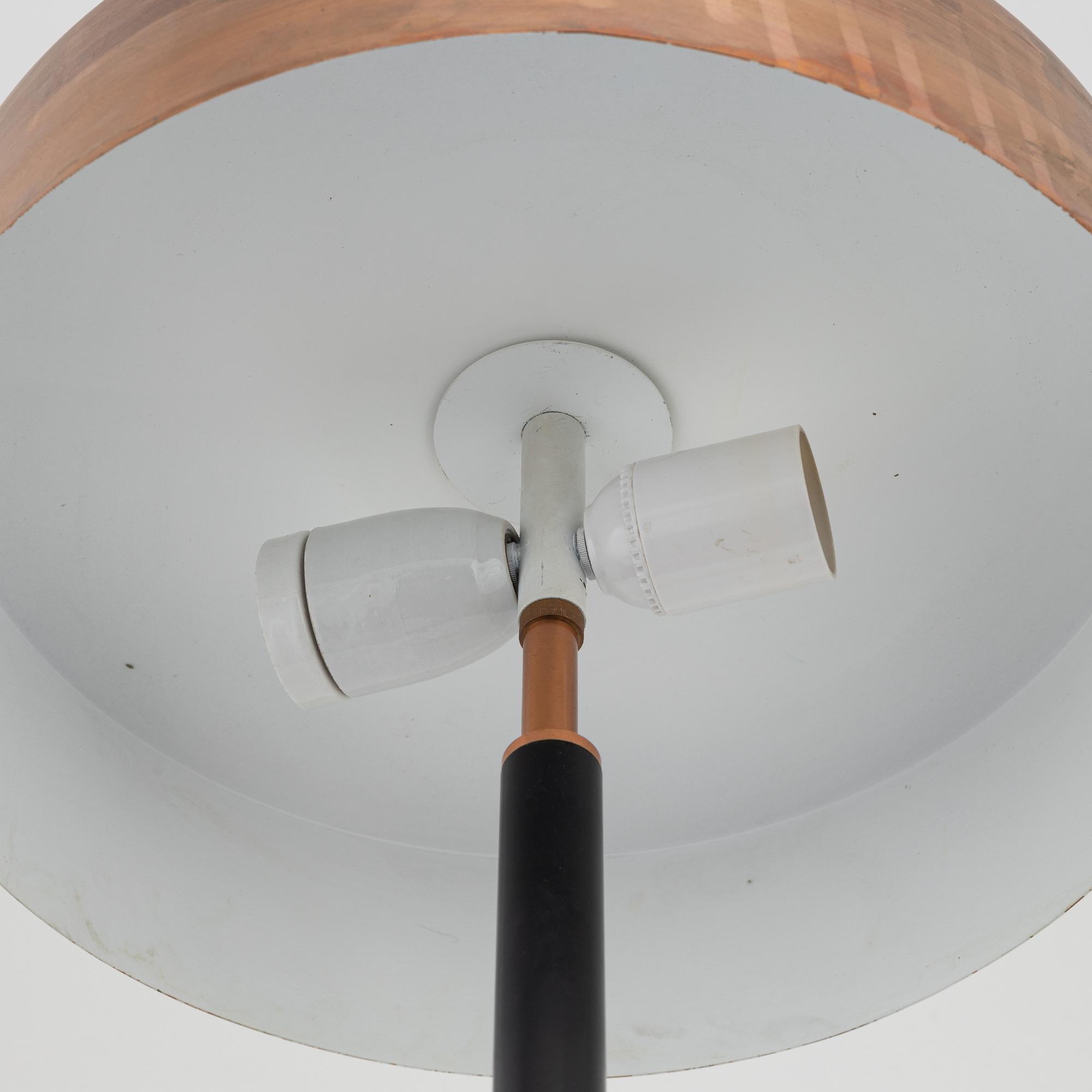 A copper table light, mid 20th Century.