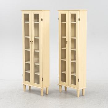 A pair of Gustavian style book cabinets, 21st century.