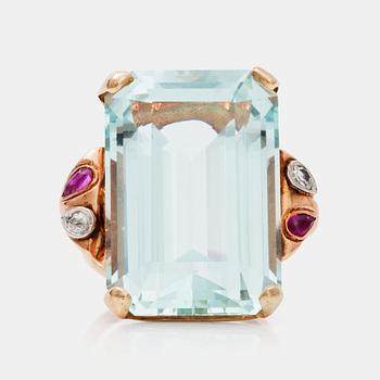 766. A circa 36.00 ct aquamarine, ruby and diamond ring.