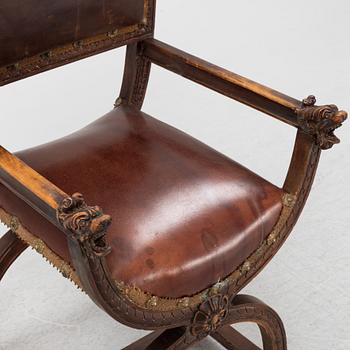 A carved Renaissace style armchair, late 19th Century.