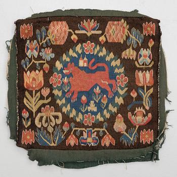 A cushion, 'Red Lion' (Rött Lejon), tapestry weave, ca 45 x 49 cm, Scania, 19th century.