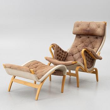 Bruno Mathsson, a 'Pernilla' armchair and ottoman, Dux.