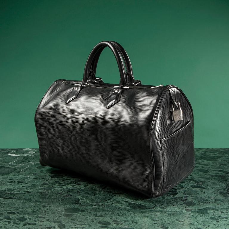 A bag "Speedy" by LOUIS VUITTON.