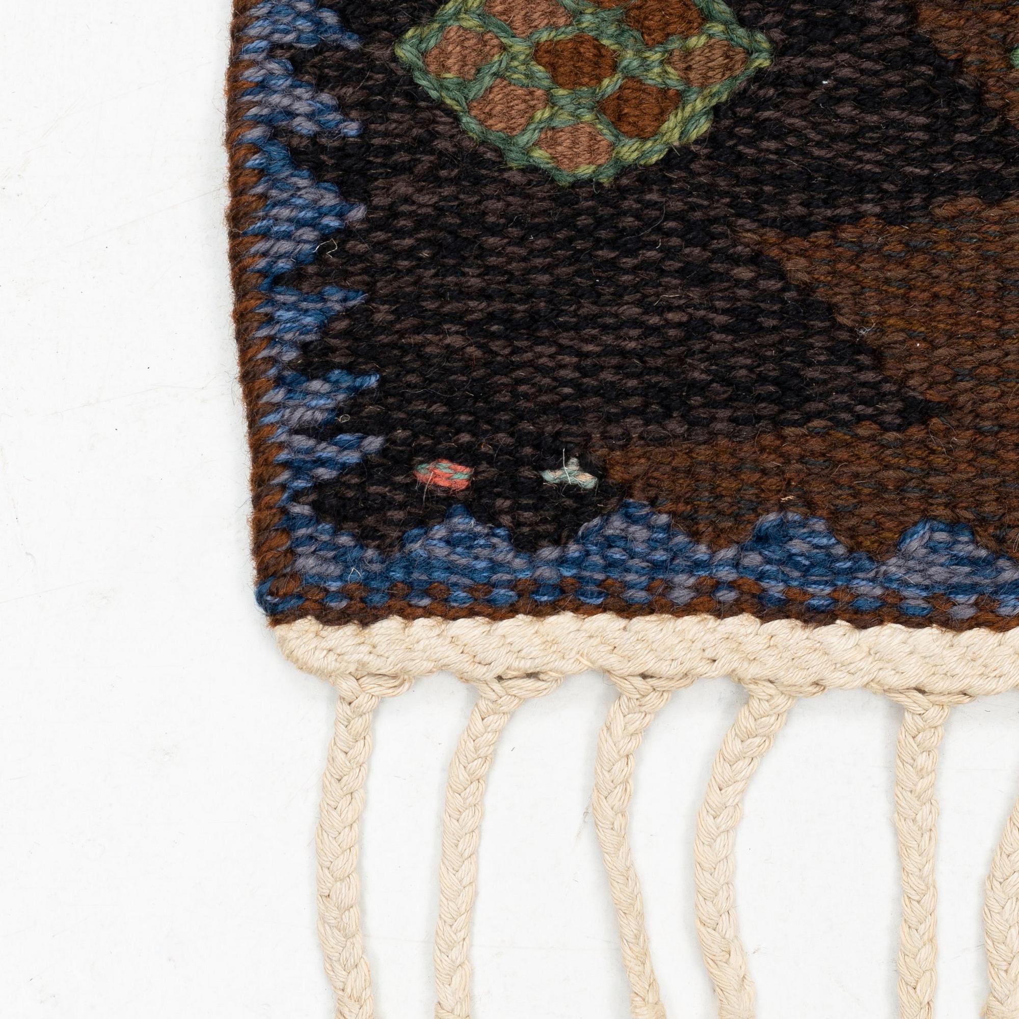 Barbro Nilsson, a carpet, flat weave, "Tånga brun och grön", ca 273 x 211 cm, signed AB MMF BN.