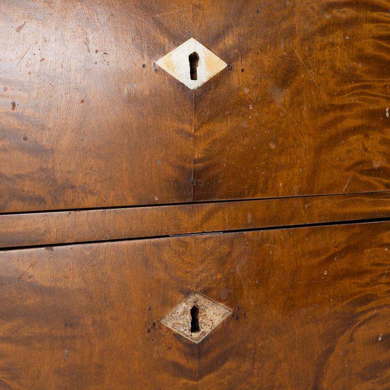 A birch-veneered dresser, second half of the 19th century.