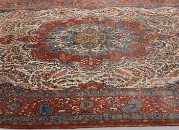 A carpet, a semi-antique Qum, ca 380,5-387,5 x 250,5-259,5 cm.