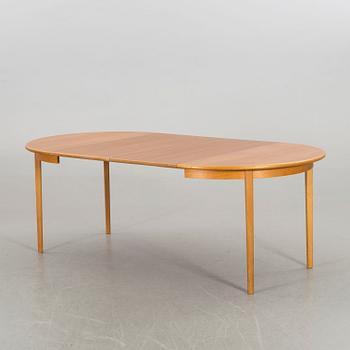 A 1960s teak veneered dining table by Bertil Fridhagen, Bodafors,