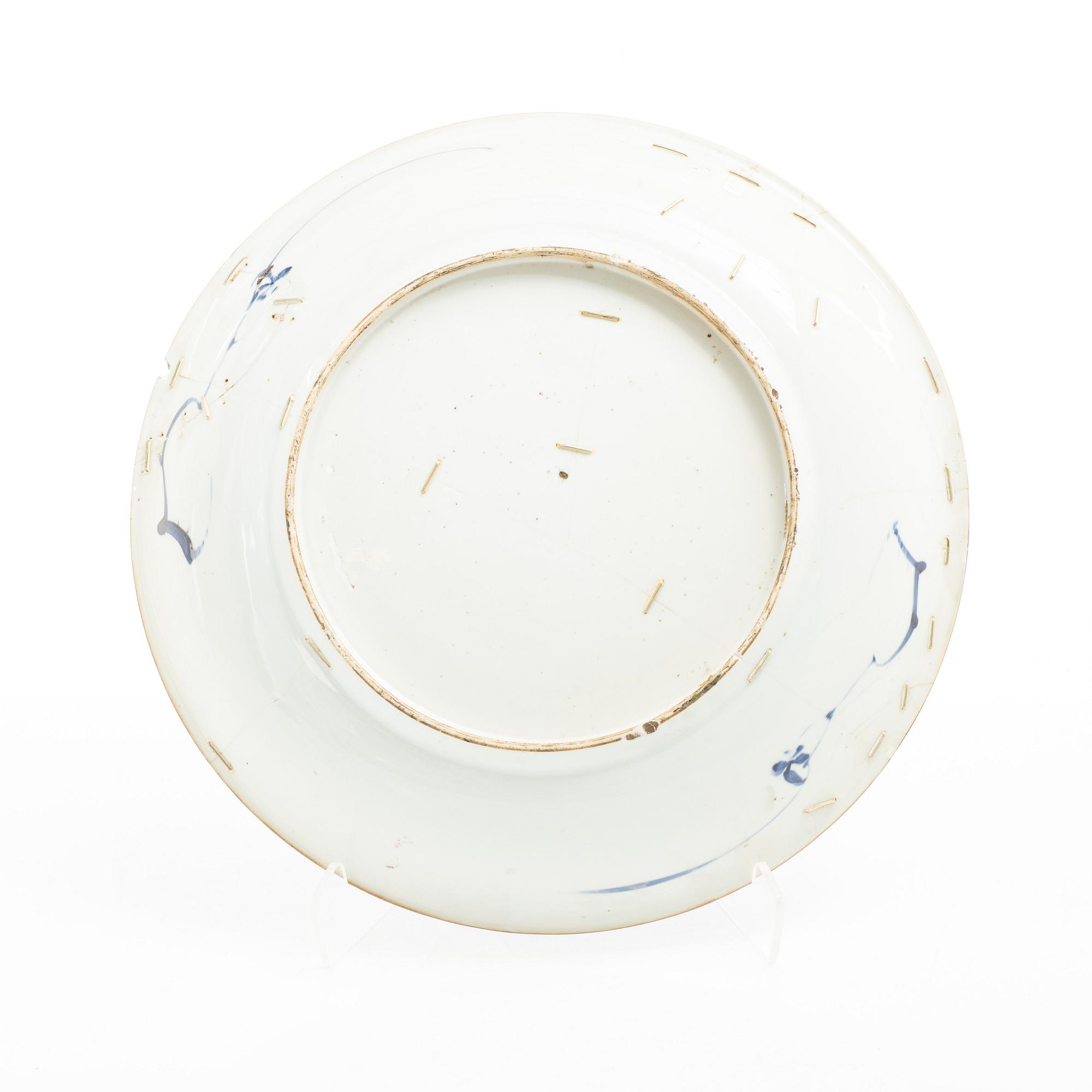 A group of three large Chinese blue and white porcelain dishes, Qing dynasty, Kangxi (1662-1722).