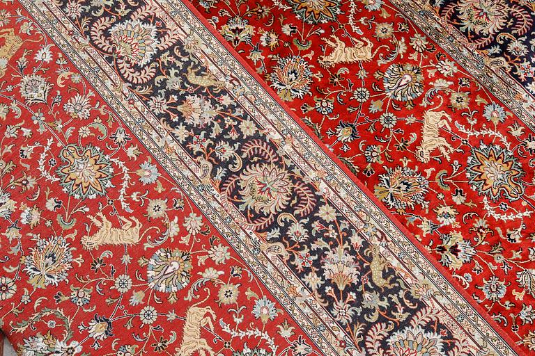 A pictoral orientalisk silk carpet, ca 284 x 180 cm.