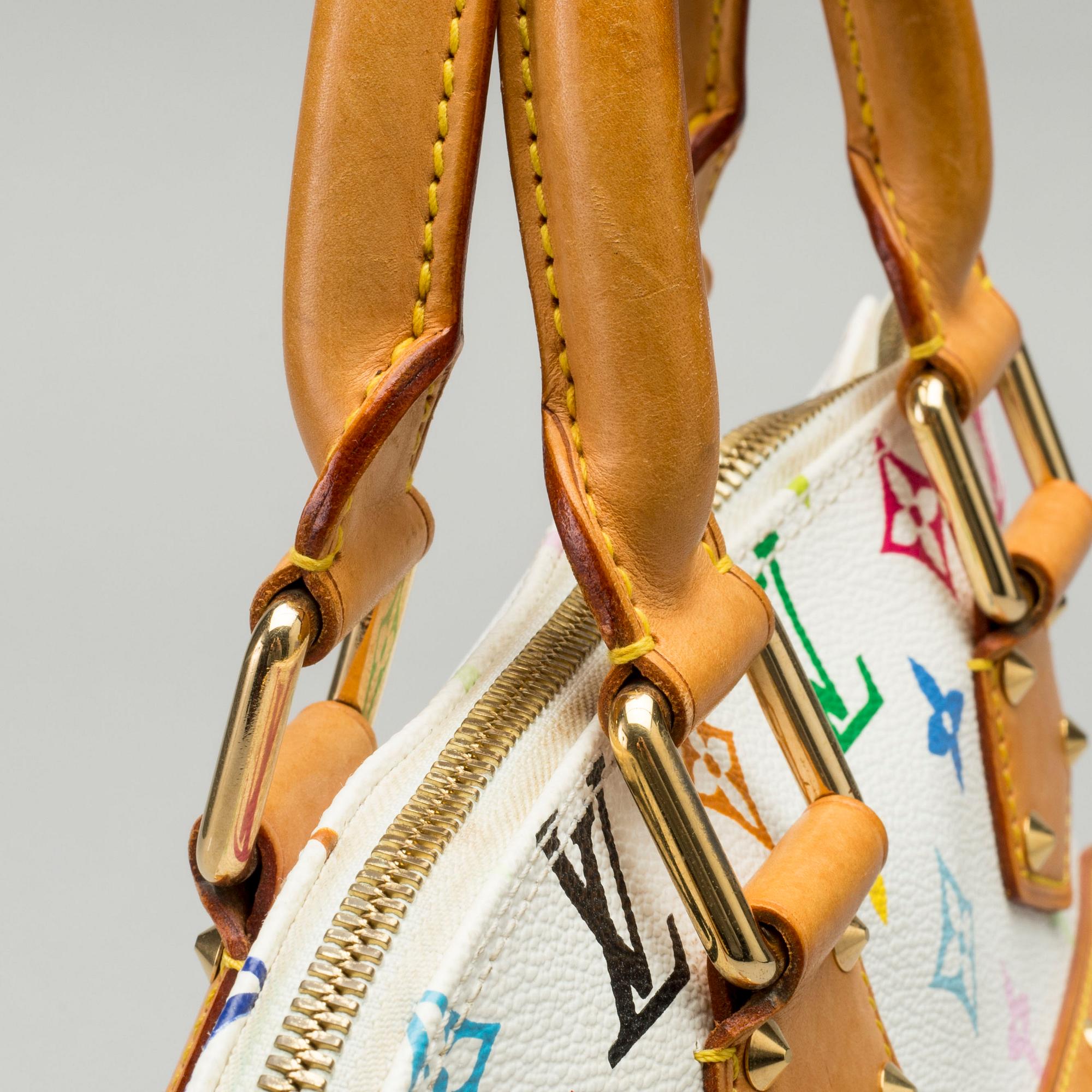 A LOUIS VUITTON ALMA BAG.