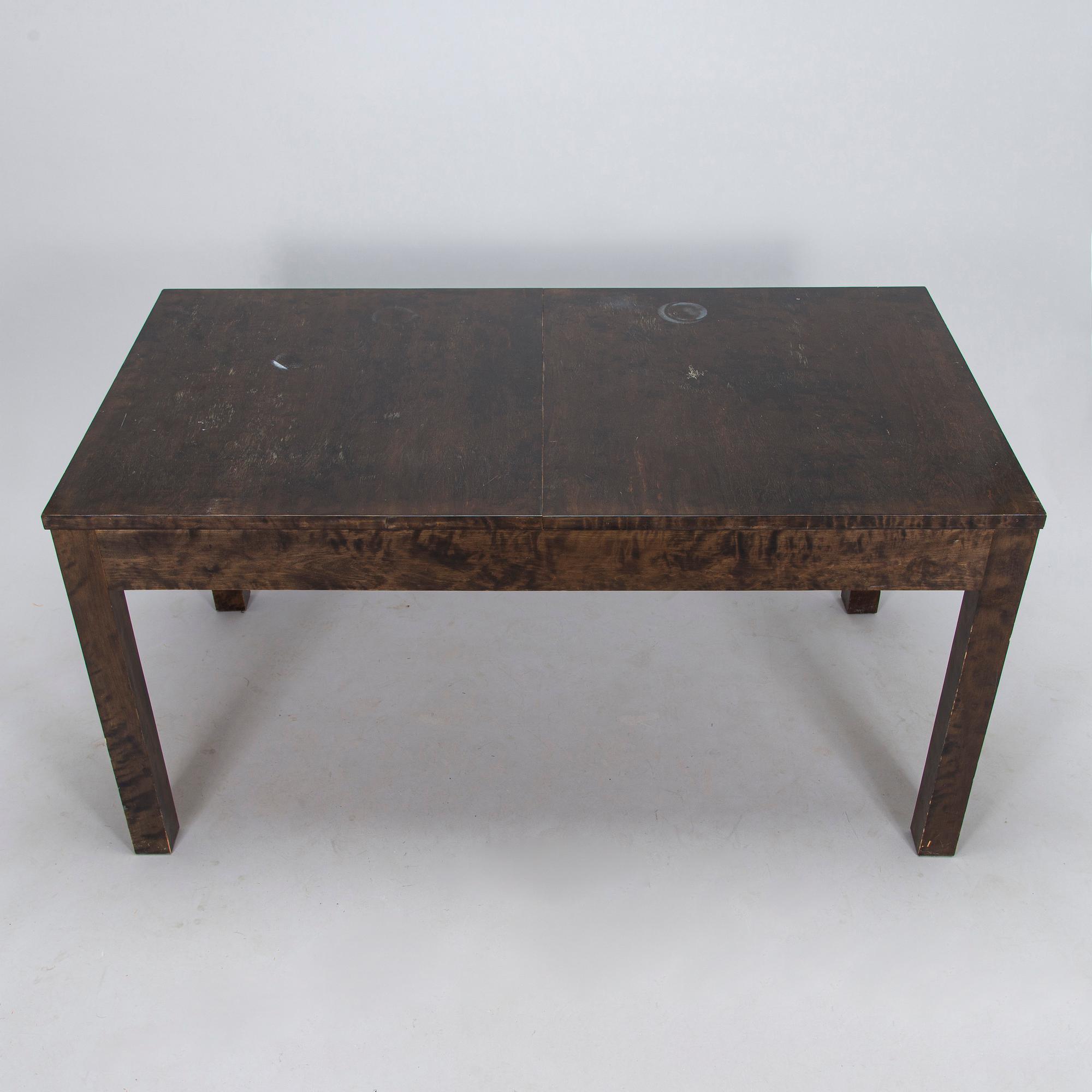 A Finnish 1930s dining table and eight chairs.