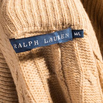 A beige wool-and cashmere poncho by Ralph Lauren.