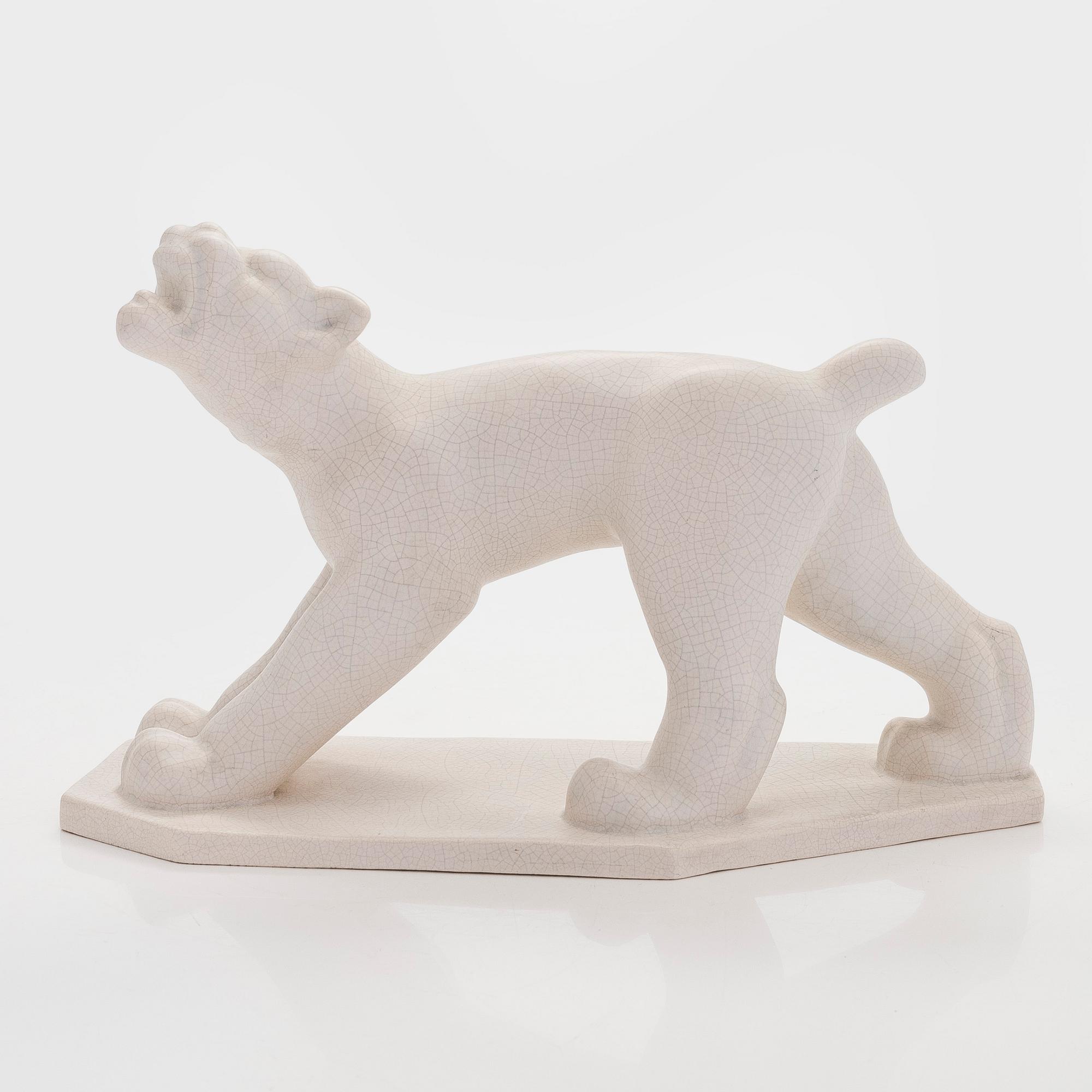 Josef Manuel, A ceramic sculpture, signed.