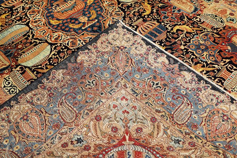 A Kashmar carpet, approx. 383 x 292 cm.