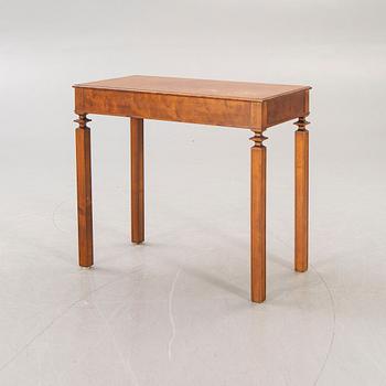 A 1930s birch table.