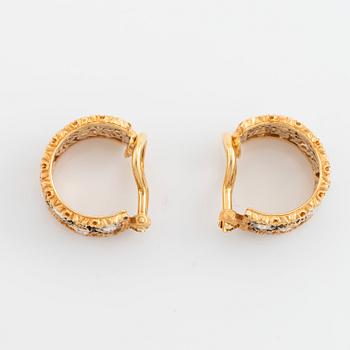 A pair of 18K gold Buccellati earrings set with rose-cut diamonds.