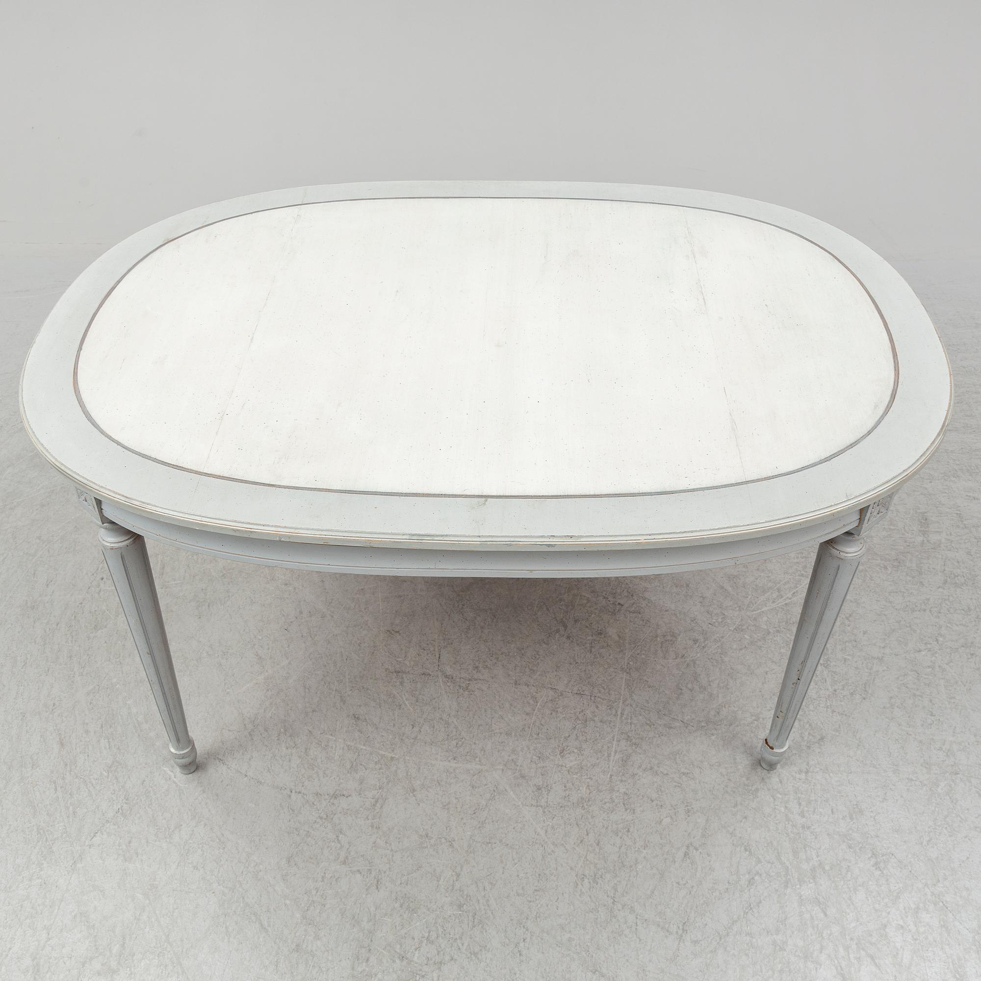 A dining table and four chairs, gustavian style, late 20th century.