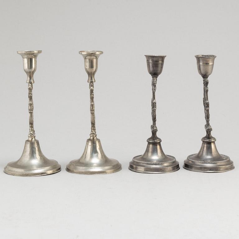 Two pair of Swedish pewter candlesticks, early 19th century and ca 1900.
