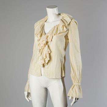 A wool/alpaca jacket by Ralph Lauren and two blouses.