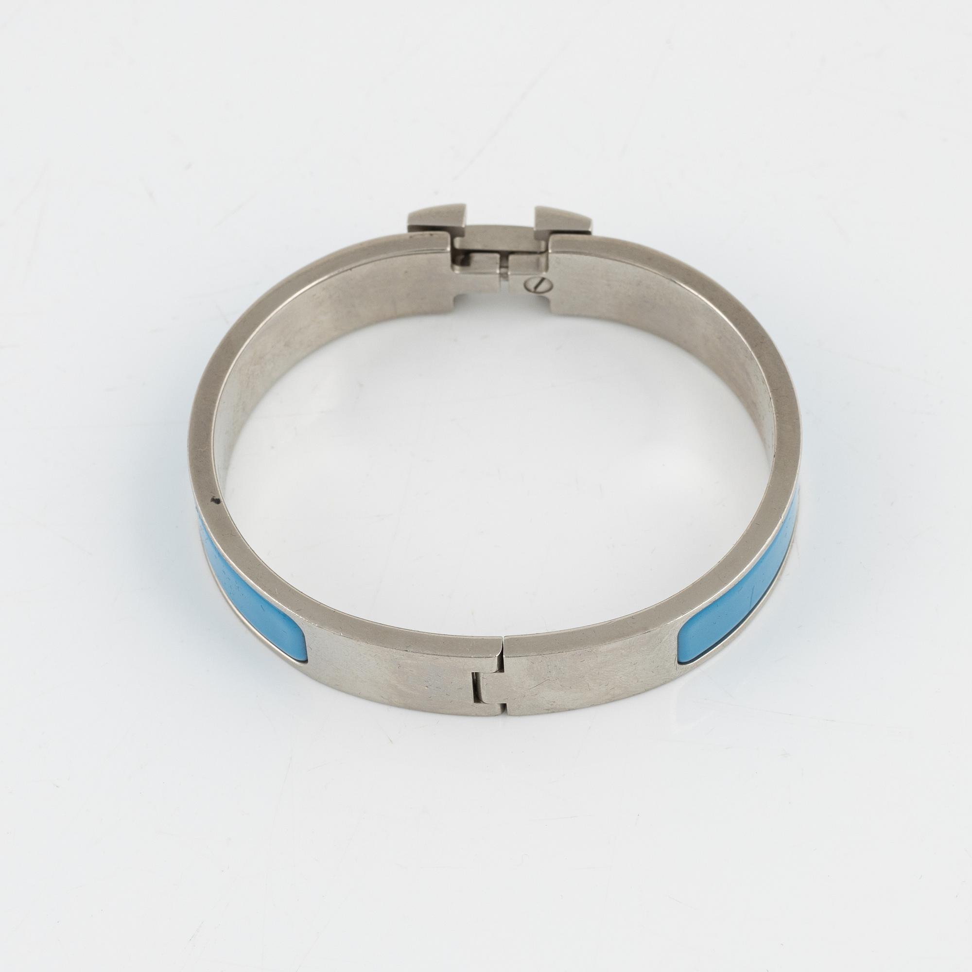 Hermès, a 'Clic H' bracelet.