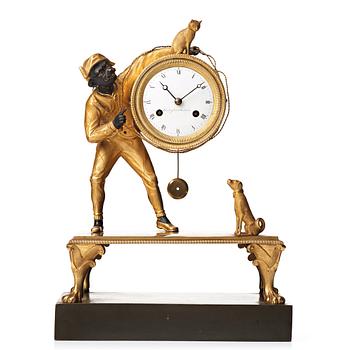 86. A Swedish Empire early 19th century mantel clock by J. E. Callerström, master 1817.