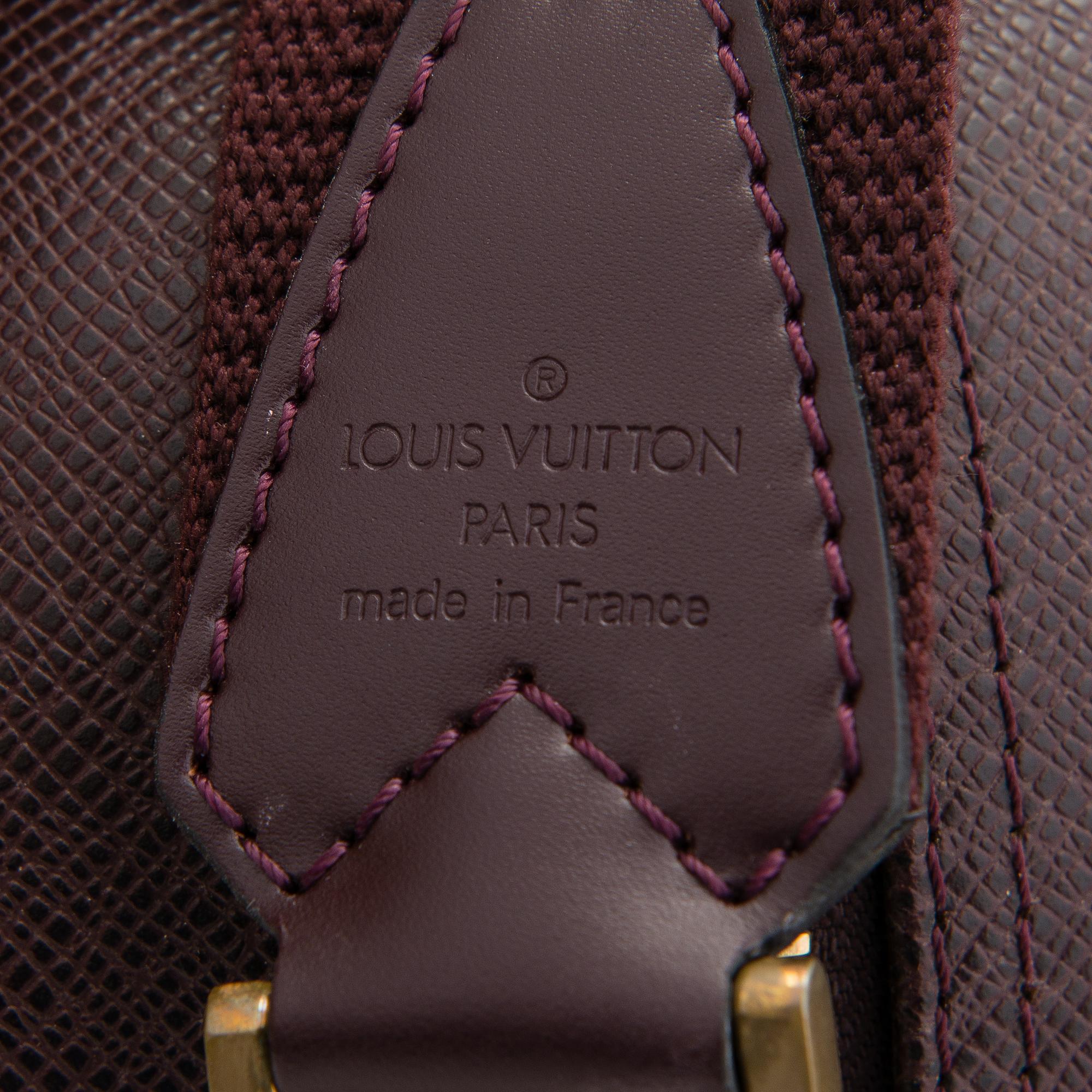 Louis Vuitton, 'Taiga Kendall PM' Bag.
