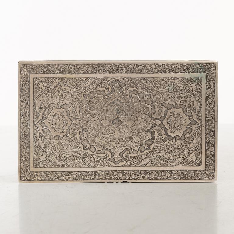 A Persian silver cigarett box, first half of the 20th century. Total weight 266 grams.