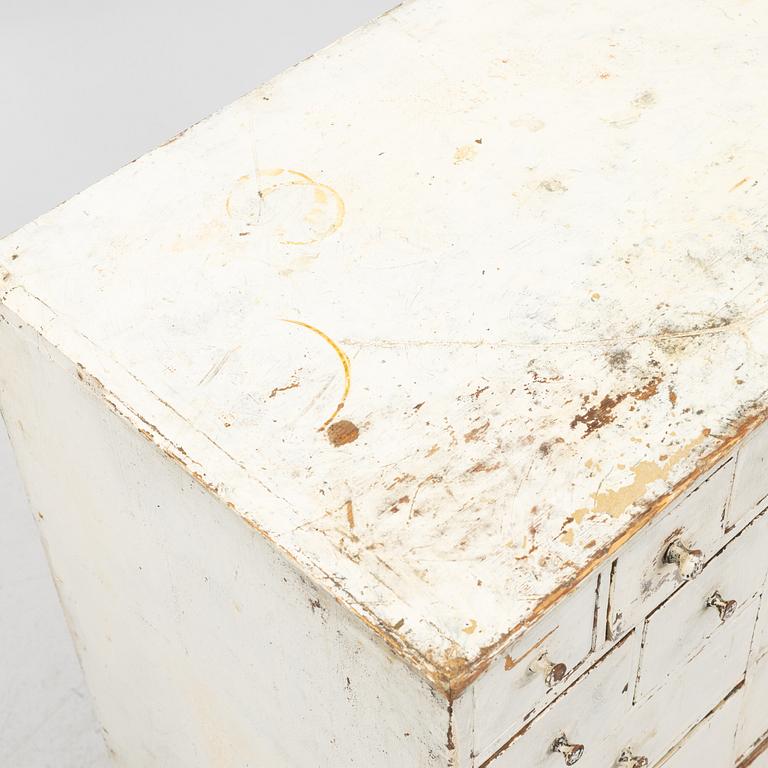 A painted chest of drawers, 20th Century.