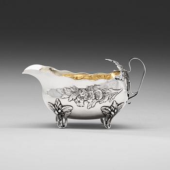 1024. A Swedish 18th century parcel-gilt cream-jug, marks of Lars Boye, Stockholm 1772.