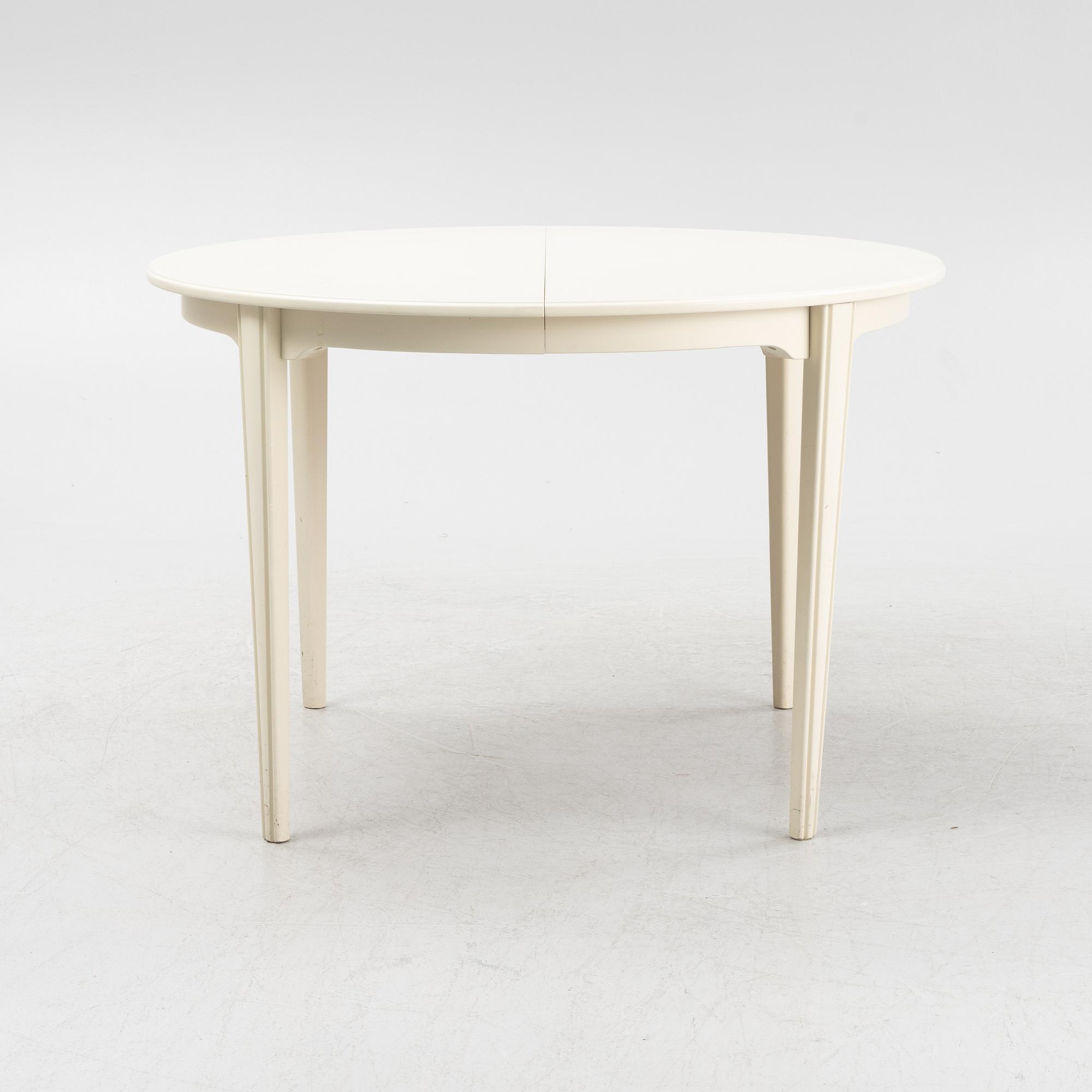 A Gustavian style table with four chairs, second half of the 20th century.