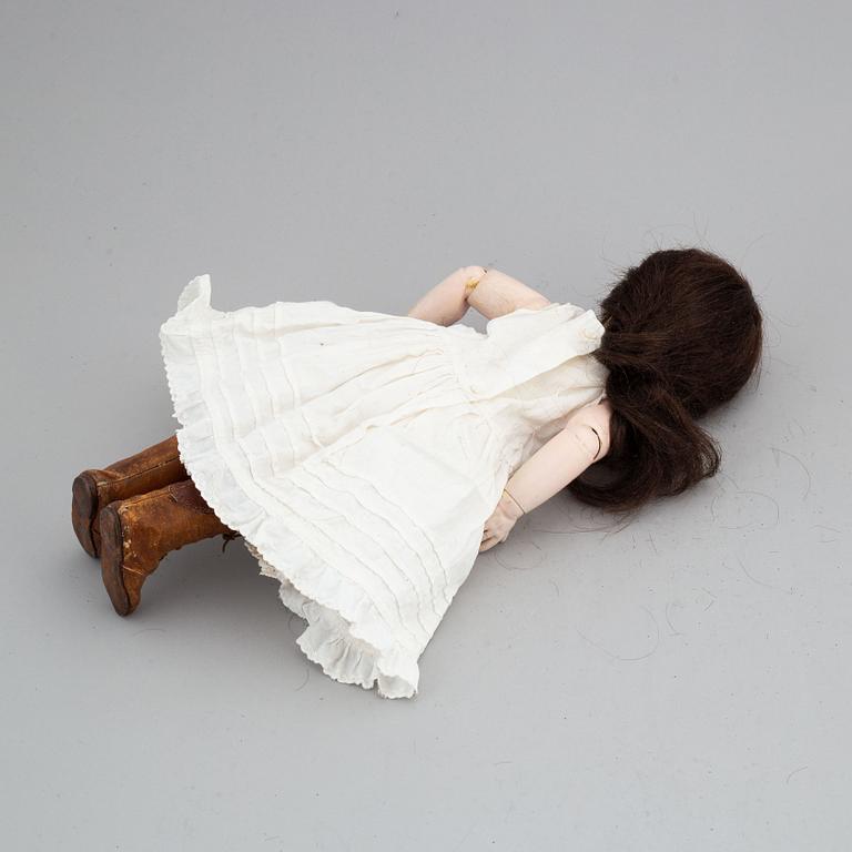 A Jullien Jeune bisque head doll.