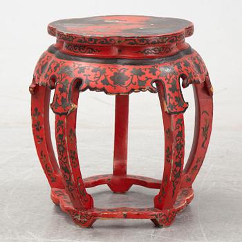 A Chinese red lacquer stool, first half of the 20th century.