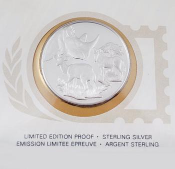 SAMLARMYNT, 36 st, sterlingsilver. Total vikt ca 1080 g.