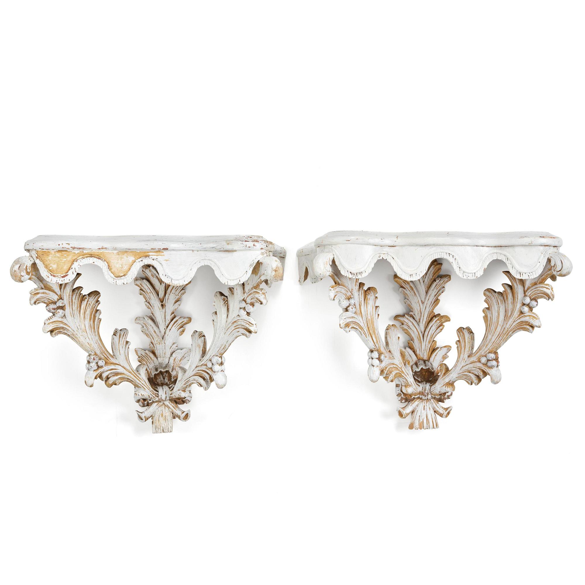 A pair of French Louis XVI-style consoles, late 19th century.