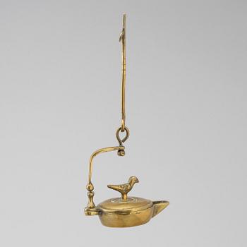 An 18th century bronze oil lamp.
