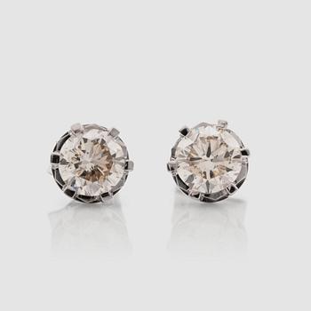 1289. A pair of brilliant-cut diamond earrings. Total carat weight circa 1.40 cts.