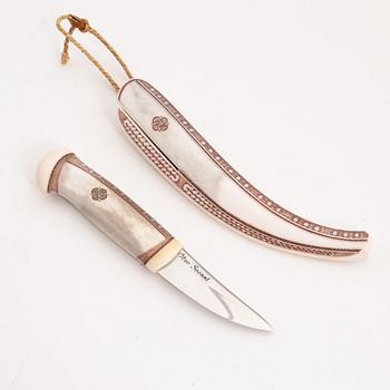 A reindeer horn knife by Olav Svonni, signed and dated 2000.