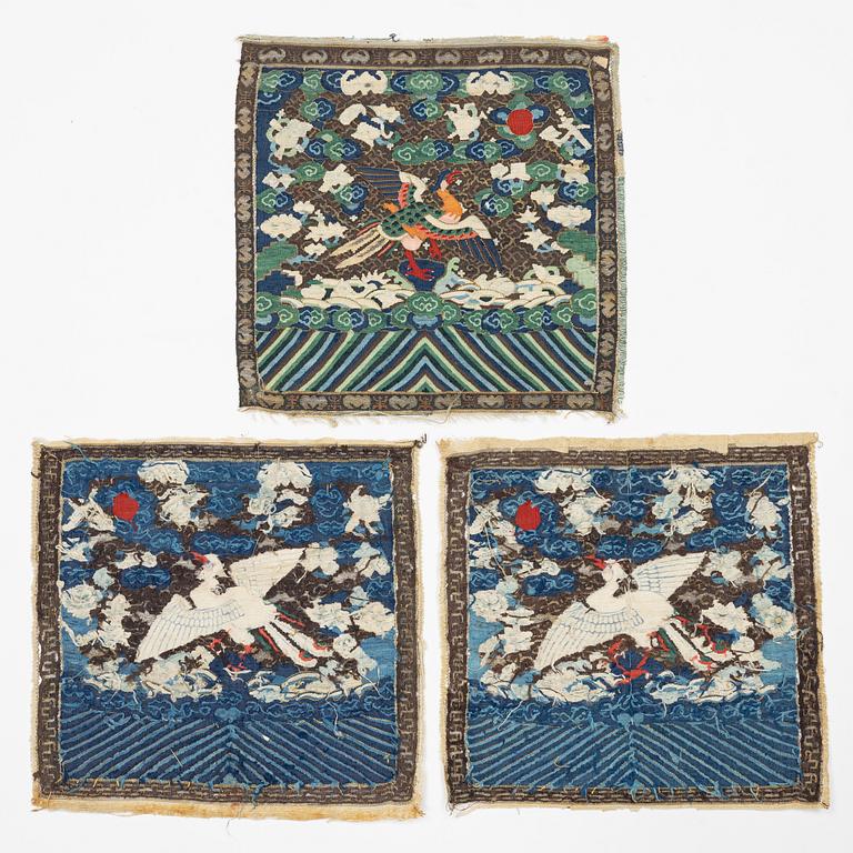 A group of three kesi rank badges with birds, Qing dynasty, 19th century.
